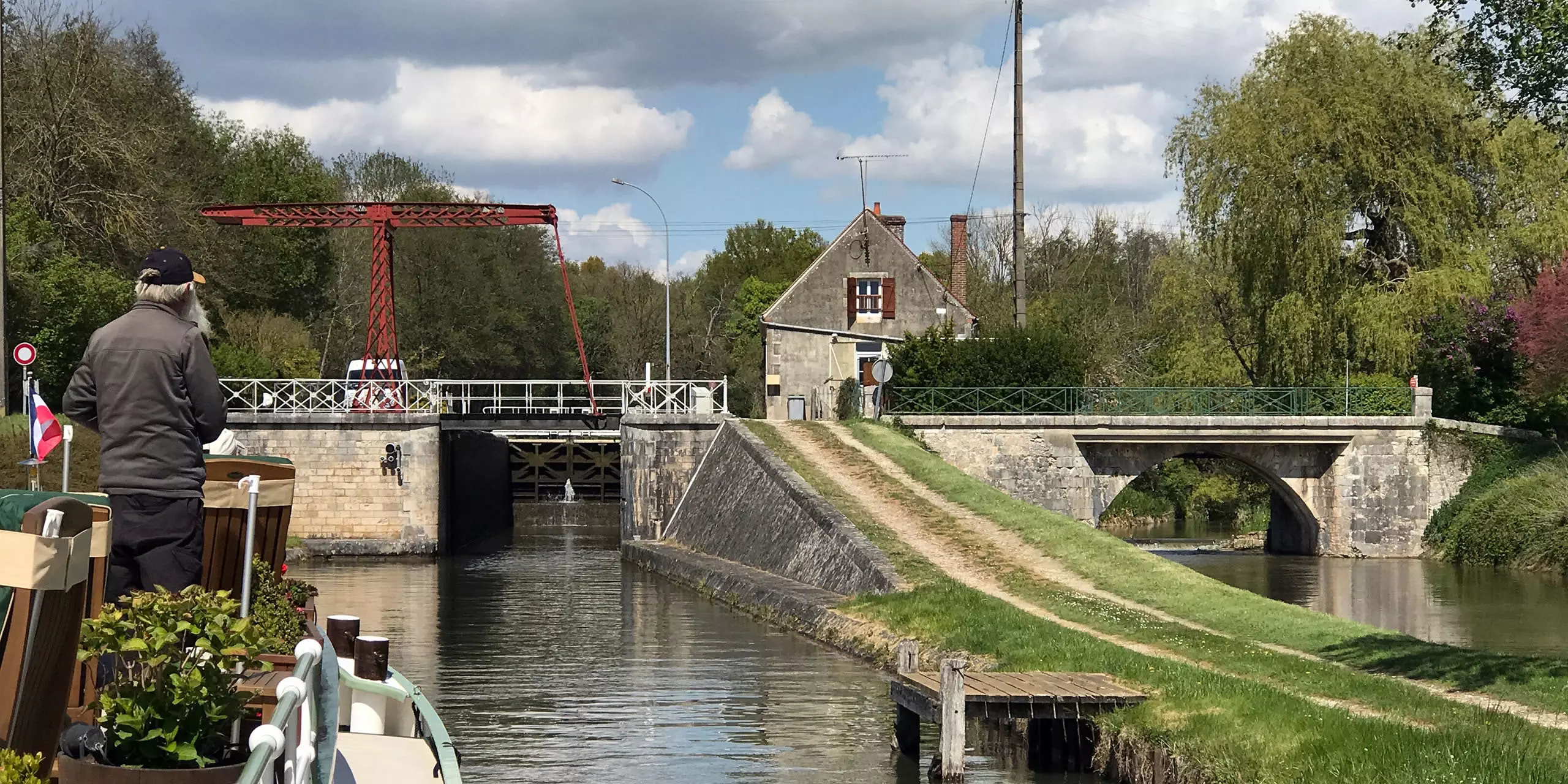 Approaching a swing bridge and lock About Colibri